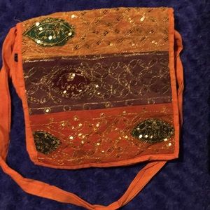 Beautiful orange purse with elegant detail